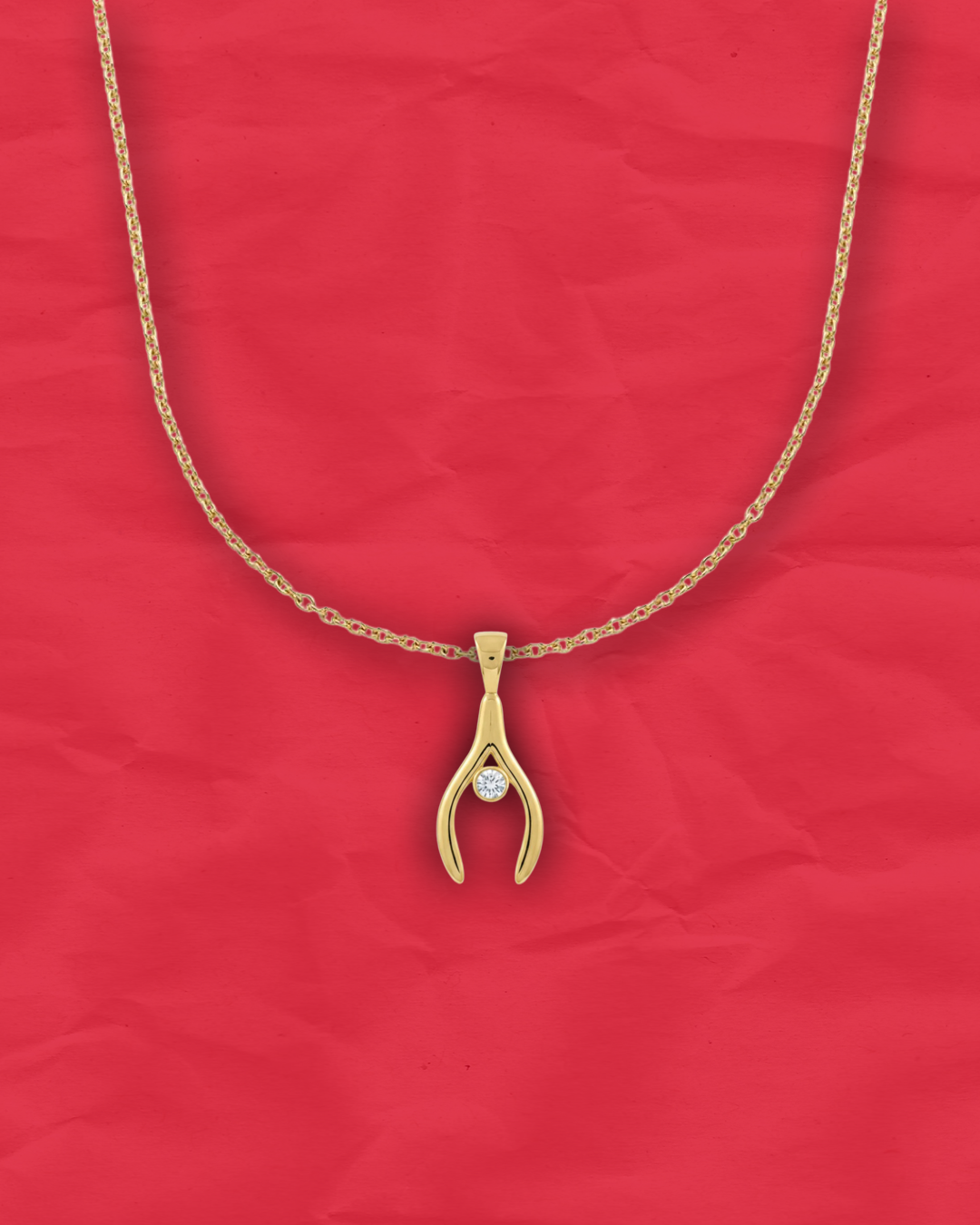 GOLDEN WISHBONE CHARM